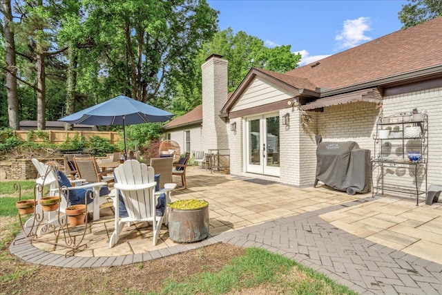 1366 Kirby Rd, Memphis, TN 38120 - view of patio featuring french doors and a grill