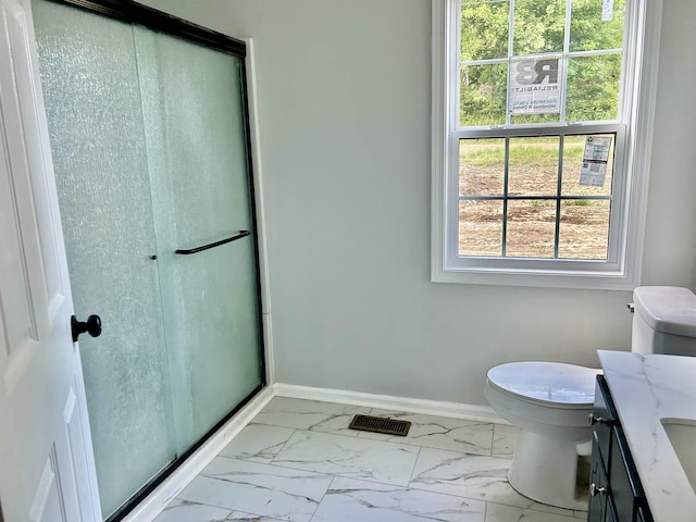 4403 W 19th Hwy, Ripley, TN 38063 - full bath featuring marble look tiles, a shower stall, toilet, vanity, and baseboards