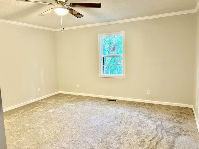 4403 W 19th Hwy, Ripley, TN 38063 - empty room featuring a ceiling fan, crown molding, carpet floors, baseboards, and a textured ceiling