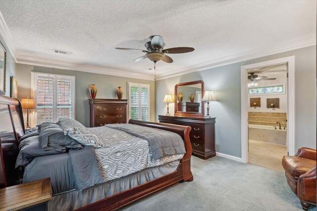 8792 E Carrollwood Ln E, Memphis, TN 38016 - bedroom with light colored carpet, ornamental molding, a textured ceiling, ensuite bath, and baseboards