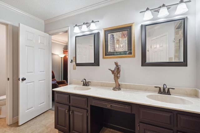8792 E Carrollwood Ln E, Memphis, TN 38016 - full bathroom featuring toilet, ornamental molding, double vanity, and tile patterned floors