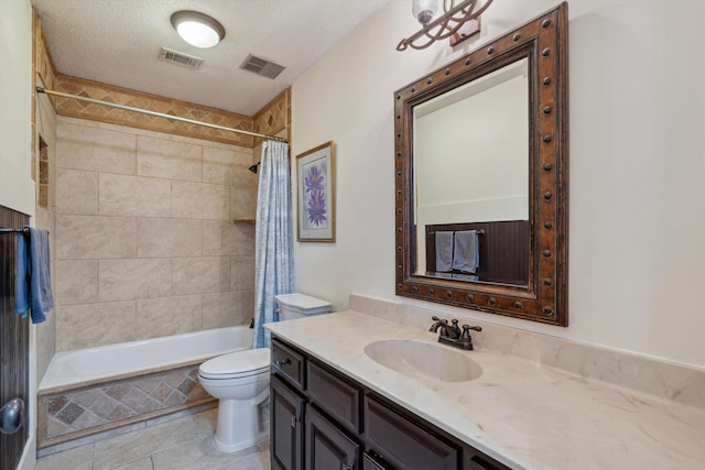 8792 E Carrollwood Ln E, Memphis, TN 38016 - full bath featuring toilet, tile patterned floors, vanity, shower / tub combo with curtain, and a textured ceiling
