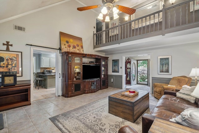 8792 E Carrollwood Ln E, Memphis, TN 38016 - living room with high vaulted ceiling, ceiling fan, and ornamental molding