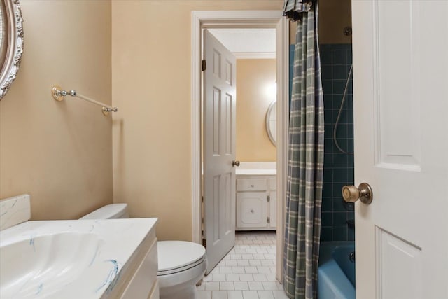 bathroom with vanity, tile patterned floors, toilet, and shower / bath combo