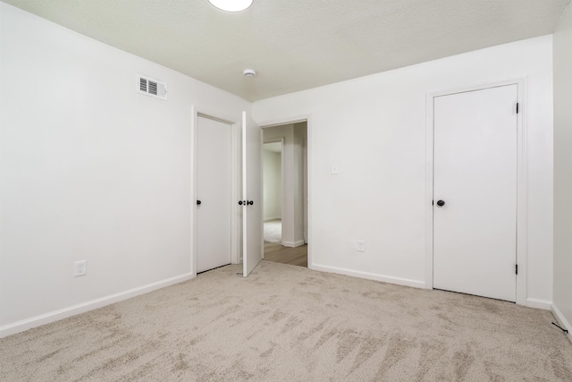 3920 Gruber Cv, Memphis, TN 38127 - unfurnished bedroom with carpet flooring and baseboards