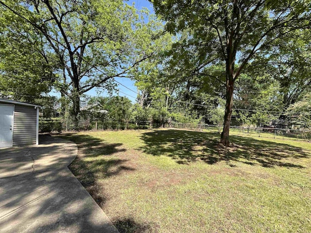 4810 Berrydale Ave, Memphis, TN 38118 - view of yard featuring an outbuilding and a shed