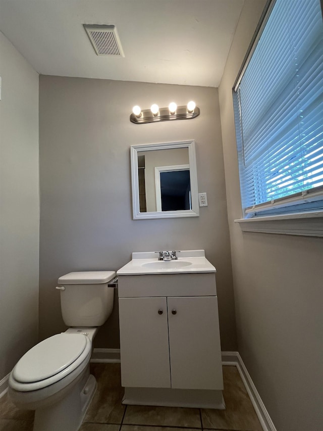 4810 Berrydale Ave, Memphis, TN 38118 - half bath featuring baseboards, toilet, and tile patterned flooring