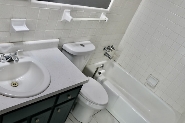 7206 N Juana Dr, Millington, TN 38053 - full bath featuring toilet, vanity, tile walls, and bathtub / shower combination
