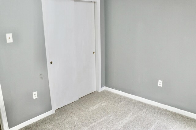 7206 N Juana Dr, Millington, TN 38053 - unfurnished bedroom featuring carpet flooring, a closet, and baseboards