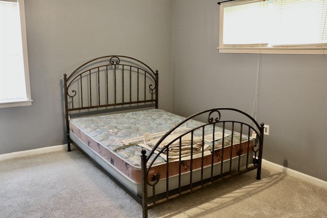 7206 N Juana Dr, Millington, TN 38053 - bedroom with carpet, multiple windows, and baseboards