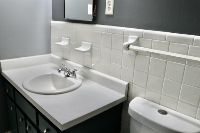 7206 N Juana Dr, Millington, TN 38053 - half bath with vanity, tile walls, and toilet