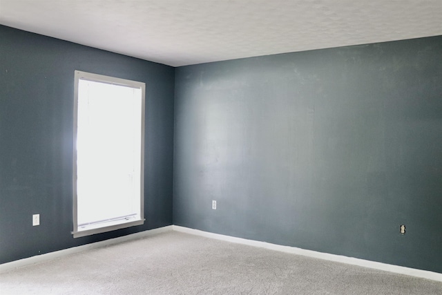 7206 N Juana Dr, Millington, TN 38053 - spare room with healthy amount of natural light, carpet, and baseboards