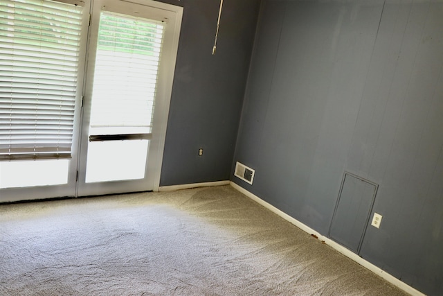 7206 N Juana Dr, Millington, TN 38053 - spare room featuring carpet flooring and baseboards