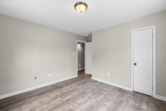 852 Marianna St, Memphis, TN 38114 - unfurnished bedroom with wood finished floors and baseboards