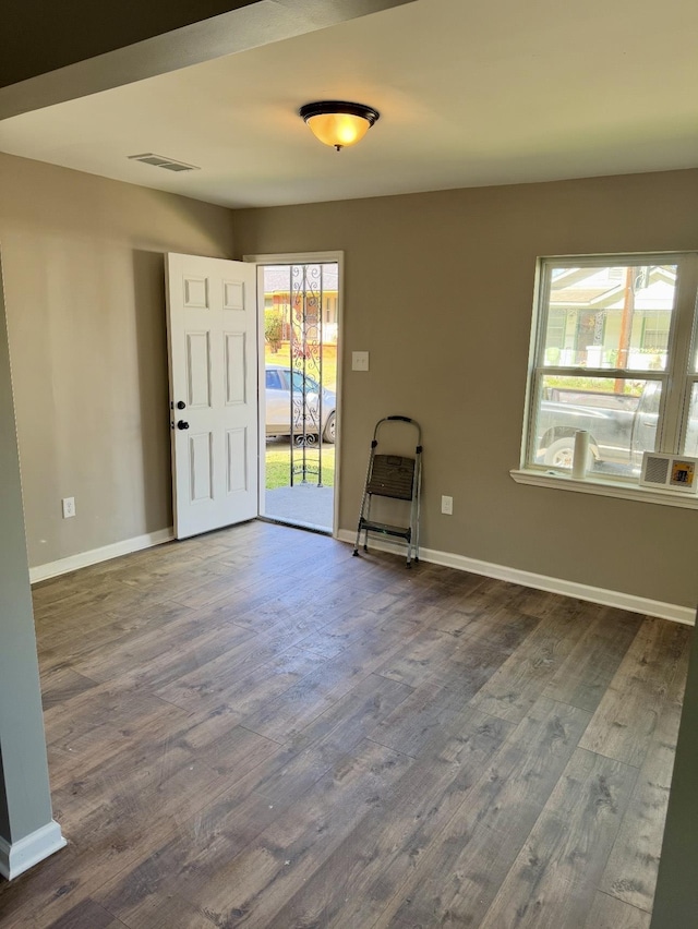 852 Marianna St, Memphis, TN 38114 - foyer with dark wood-style flooring and baseboards