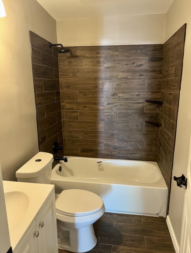 852 Marianna St, Memphis, TN 38114 - bathroom with toilet, shower / tub combination, vanity, and wood finished floors