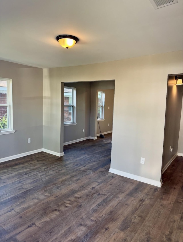 852 Marianna St, Memphis, TN 38114 - unfurnished room featuring dark wood-style flooring and baseboards