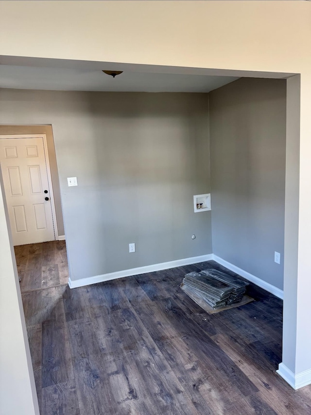 852 Marianna St, Memphis, TN 38114 - empty room with dark wood-style flooring and baseboards