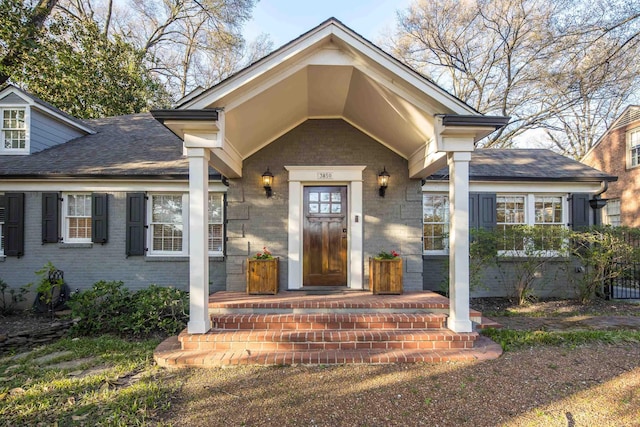3850 Poplar Ave, Memphis, TN 38111 - entrance to property with brick siding and a shingled roof