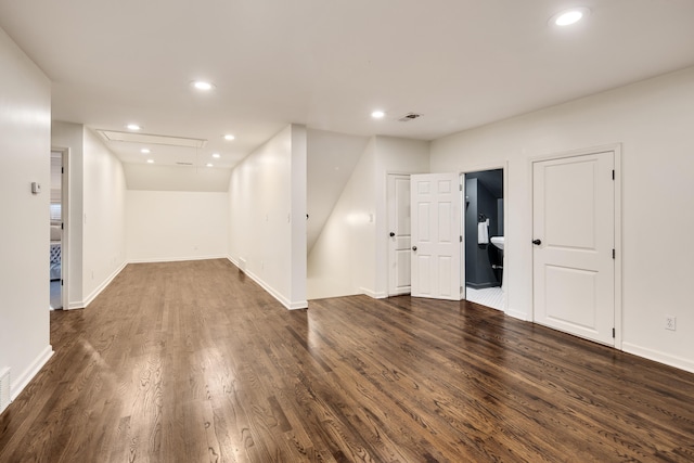3850 Poplar Ave, Memphis, TN 38111 - below grade area with dark wood-style floors, recessed lighting, and baseboards