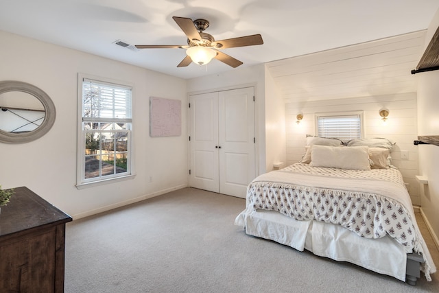 3850 Poplar Ave, Memphis, TN 38111 - bedroom with carpet flooring, baseboards, ceiling fan, and a closet