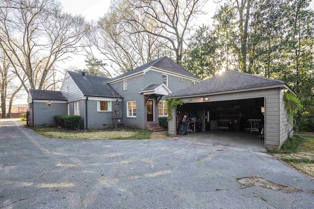 3850 Poplar Ave, Memphis, TN 38111 - view of front of home featuring an outbuilding and roof with shingles