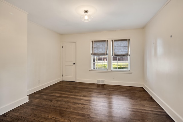 3850 Poplar Ave, Memphis, TN 38111 - empty room featuring dark wood-style flooring, ornamental molding, and baseboards