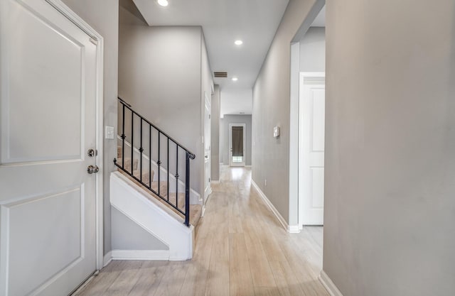 135 Briar Hollow Ln, Oakland, TN 38060 - foyer featuring light wood-type flooring, baseboards, stairs, and recessed lighting