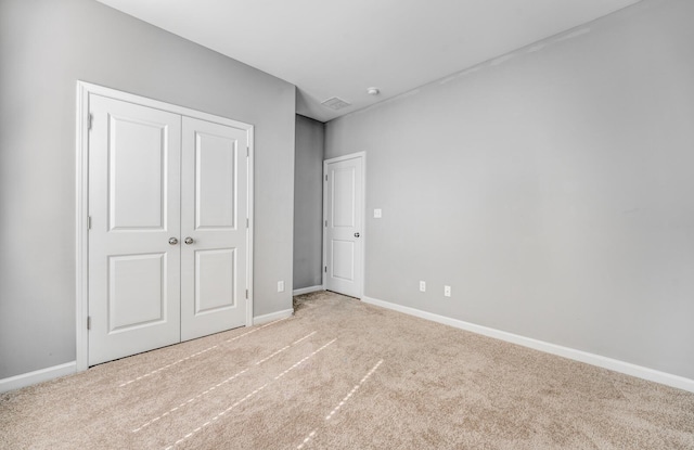 135 Briar Hollow Ln, Oakland, TN 38060 - unfurnished bedroom featuring carpet flooring, baseboards, and a closet