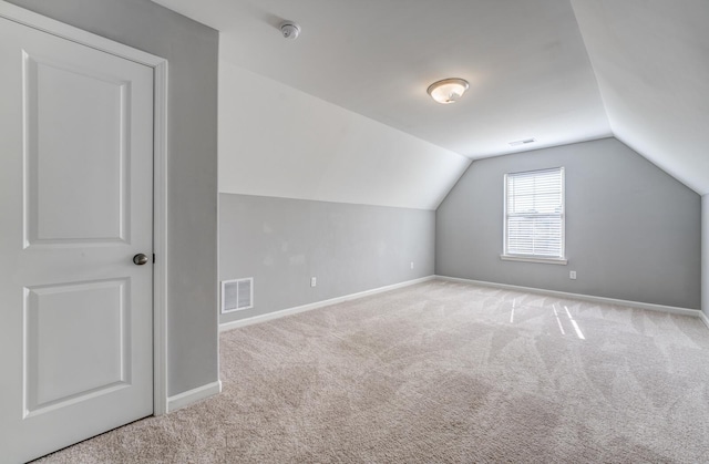 135 Briar Hollow Ln, Oakland, TN 38060 - additional living space featuring carpet, baseboards, and vaulted ceiling