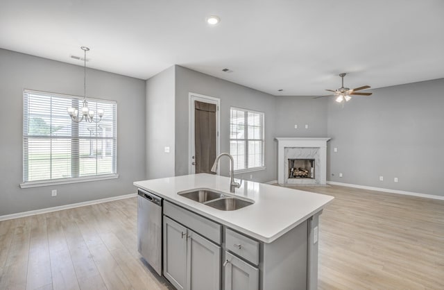 135 Briar Hollow Ln, Oakland, TN 38060 - kitchen featuring a sink, gray cabinets, stainless steel dishwasher, a high end fireplace, and ceiling fan