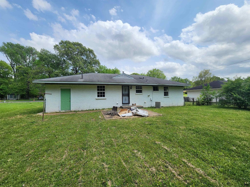 4785 Haleville Rd, Memphis, TN 38611 - back of house with a patio and brick siding