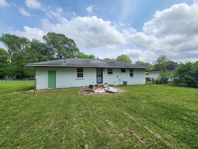 4785 Haleville Rd, Memphis, TN 38611 - back of house with a patio and brick siding