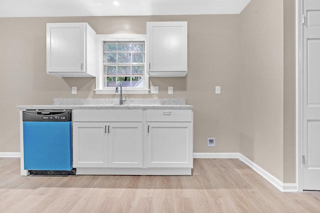 1793 Hayden Rd, Germantown, TN 38138 - kitchen featuring dishwasher, baseboards, white cabinetry, light wood-style floors, and a sink