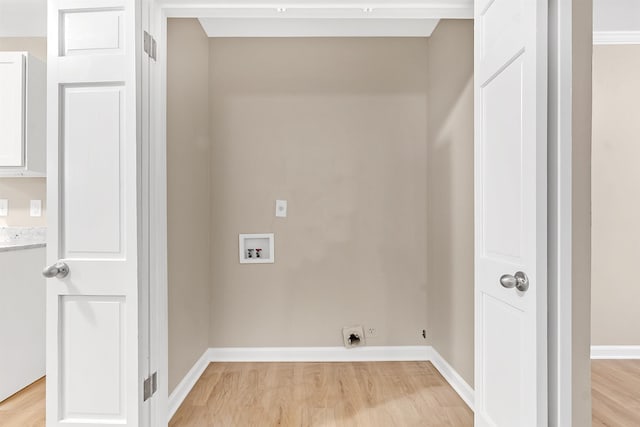 1793 Hayden Rd, Germantown, TN 38138 - clothes washing area with hookup for a washing machine, light wood finished floors, and baseboards
