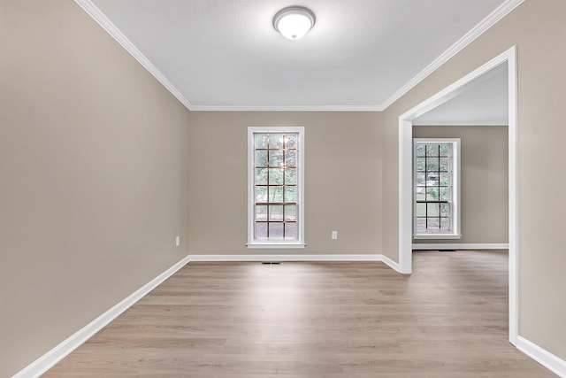 1793 Hayden Rd, Germantown, TN 38138 - empty room featuring wood finished floors, ornamental molding, and baseboards