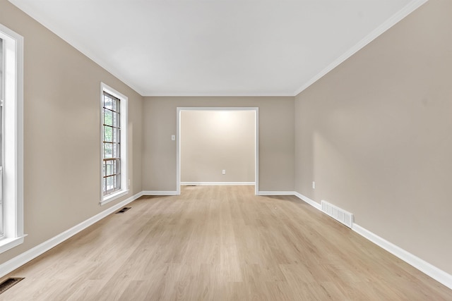 1793 Hayden Rd, Germantown, TN 38138 - spare room with light wood-style flooring, baseboards, and ornamental molding