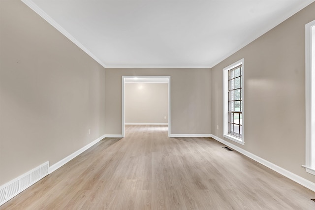 1793 Hayden Rd, Germantown, TN 38138 - empty room with light wood-style floors, baseboards, and ornamental molding