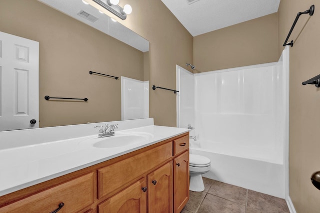 bathroom featuring vanity, shower / tub combination, toilet, and tile patterned flooring