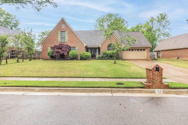 traditional home featuring brick siding, a garage, concrete driveway, and roof with shingles
