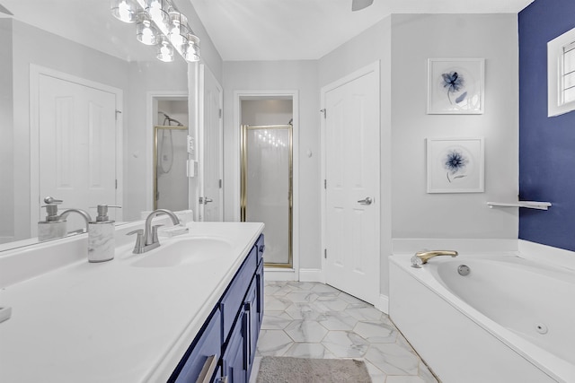 full bathroom featuring a stall shower, vanity, a garden tub, and tile patterned floors