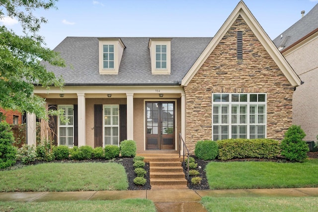 984 Russell Farms Rd, Collierville, TN 38017 - view of front of property with stone siding, french doors, a shingled roof, and a front yard