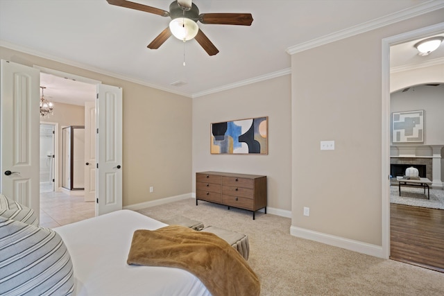 984 Russell Farms Rd, Collierville, TN 38017 - bedroom featuring ornamental molding, baseboards, a chandelier, light colored carpet, and arched walkways