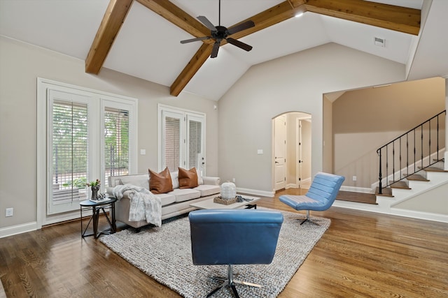 984 Russell Farms Rd, Collierville, TN 38017 - living room featuring wood finished floors, ceiling fan, baseboards, stairway, and arched walkways