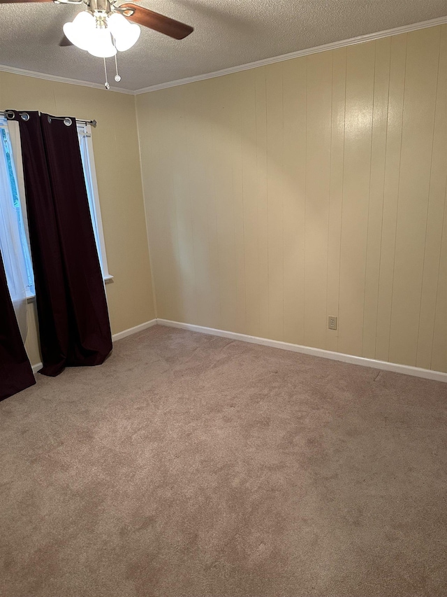 3236 Whitney Rd, Memphis, TN 38128 - empty room with a textured ceiling, carpet floors, ceiling fan, and ornamental molding