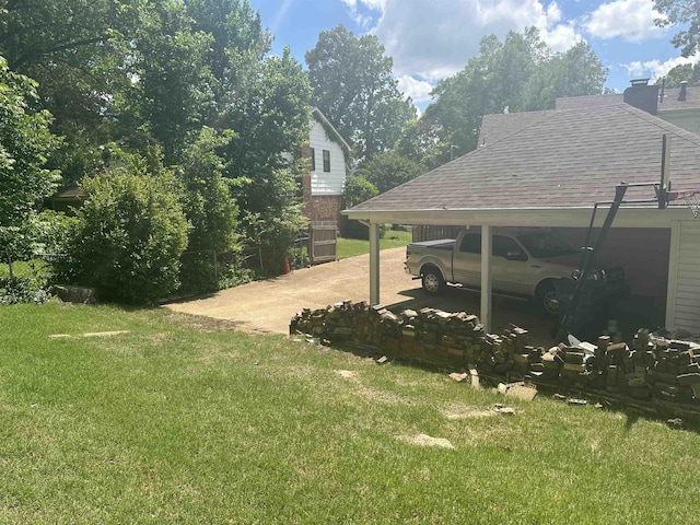 3236 Whitney Rd, Memphis, TN 38128 - view of grassy yard with a carport