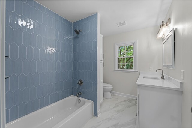 5516 Sycamore Grove Ln, Memphis, TN 38120 - full bathroom with toilet, shower / tub combination, marble finish flooring, vanity, and baseboards