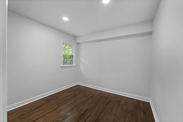 5516 Sycamore Grove Ln, Memphis, TN 38120 - empty room featuring dark wood-type flooring, baseboards, and recessed lighting