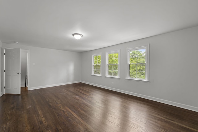 5516 Sycamore Grove Ln, Memphis, TN 38120 - spare room with baseboards and dark wood-type flooring