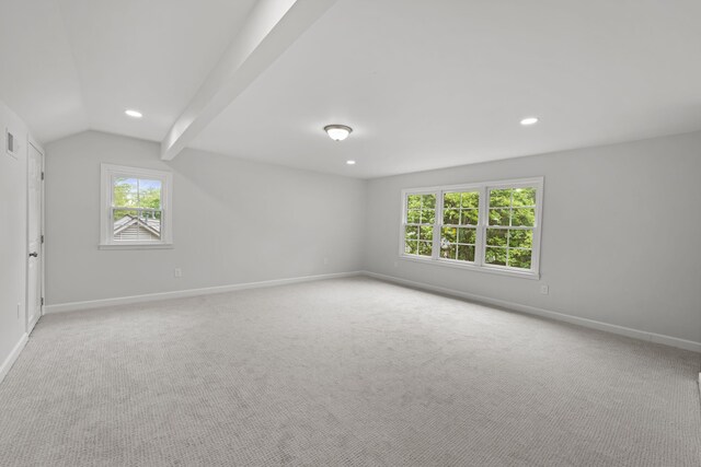 5516 Sycamore Grove Ln, Memphis, TN 38120 - empty room with plenty of natural light, baseboards, vaulted ceiling, light colored carpet, and recessed lighting